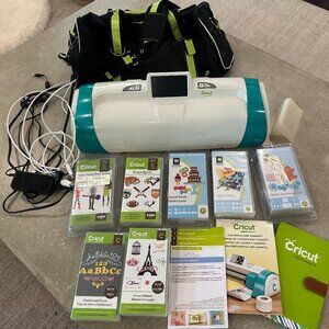 Cricut Expression 2 with carrying tote and 7 cartridges Exc Cond over $400 value